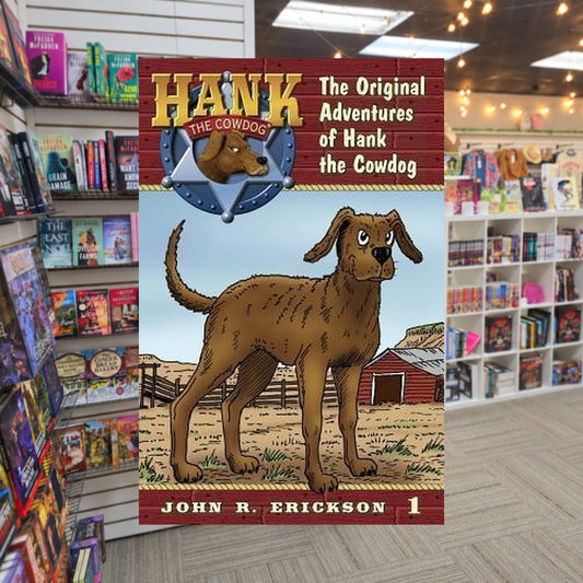 The Original Adventures of Hank the Cowdog by John R. Erickson — actual cover on The Perk bookstore background