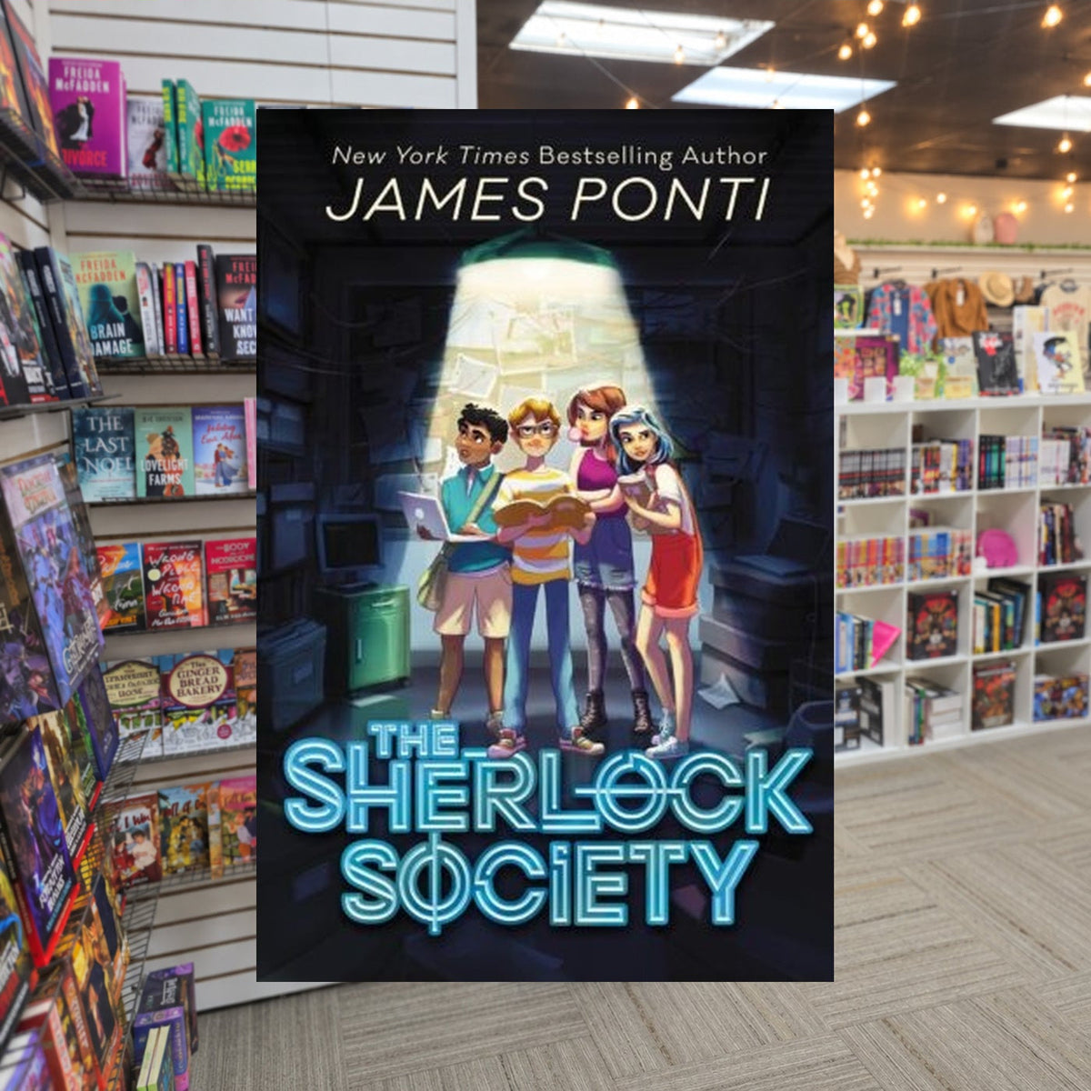The Sherlock Society by James Ponti — actual cover on The Perk bookstore background