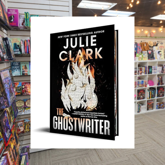 The Ghostwriter by Julie Clark — actual cover on The Perk bookstore background