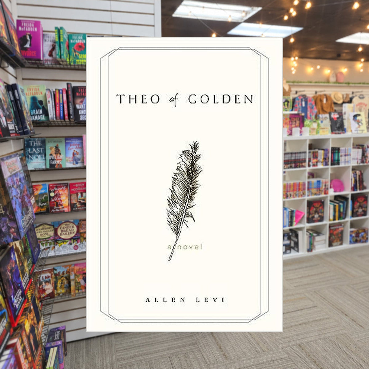 Theo of Golden by Allen Levi — actual cover on The Perk bookstore background