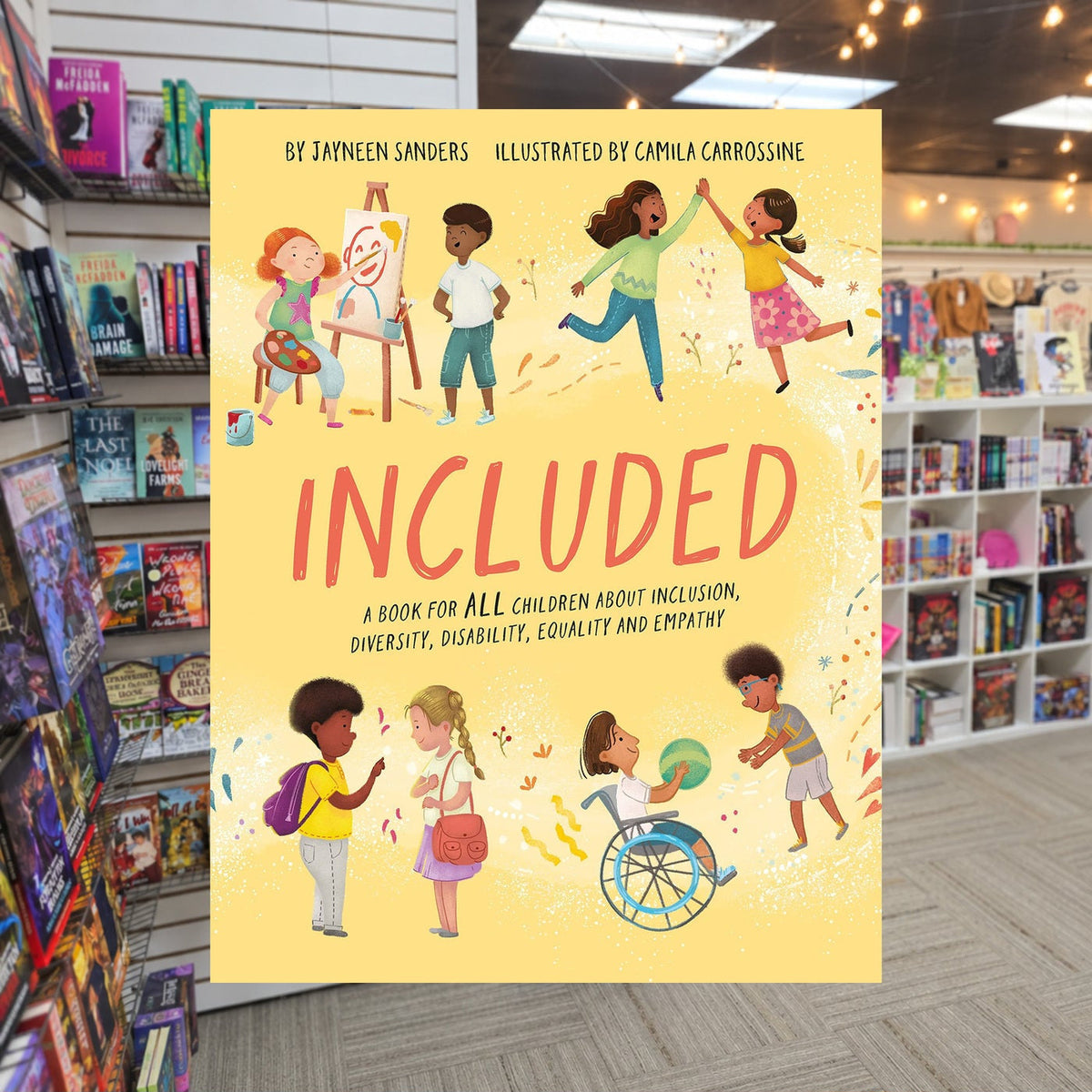 Included: A book for all children about inclusion, diversity, disability, equality and empathy by Jayneen Sanders — actual cover on The Perk bookstore background
