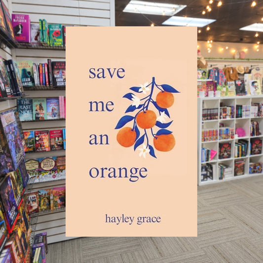 Save Me an Orange by Hayley Grace — actual cover on The Perk bookstore background