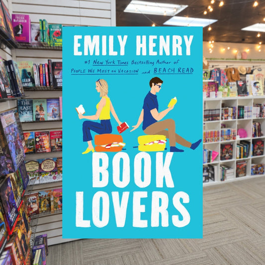 Book Lovers by Emily Henry — actual cover on The Perk bookstore background
