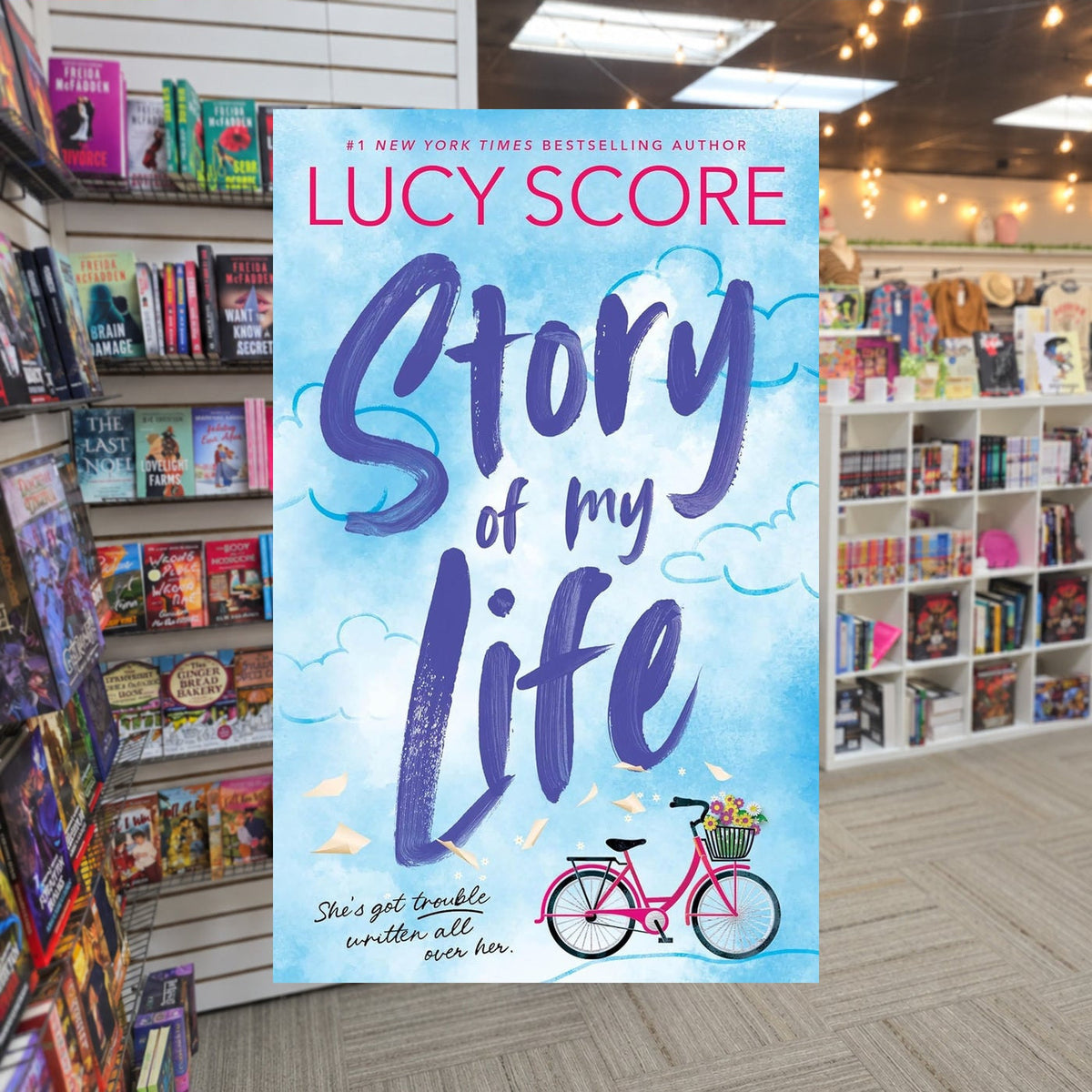 Story Lake #1: Story of My Life by Lucy Score — actual cover on The Perk bookstore background