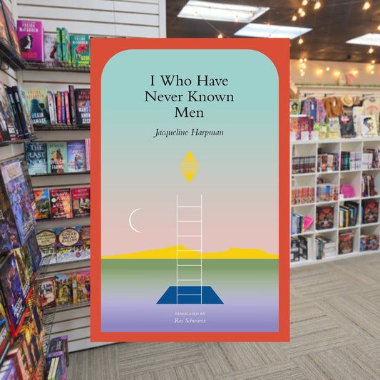 I Who Have Never Known Men by Jacqueline Harpman,  Ros Schwartz (Translator), Sophie Mackintosh (Afterword) — actual cover on The Perk bookstore background