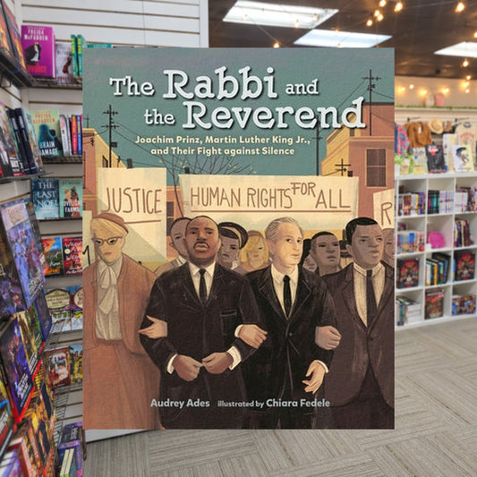 The Rabbi and the Reverend: Joachim Prinz, Martin Luther King Jr., and Their Fight against Silence by Audrey Ades — actual cover on The Perk bookstore background