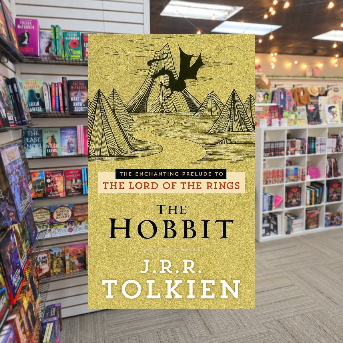 The Hobbit by J.R.R. Tolkien — actual cover on The Perk bookstore background
