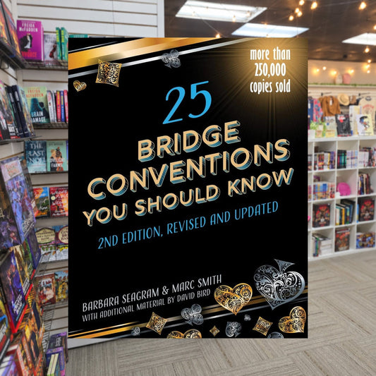 25 Bridge Conventions You Should Know by Barbara Seagram — actual cover on The Perk bookstore background