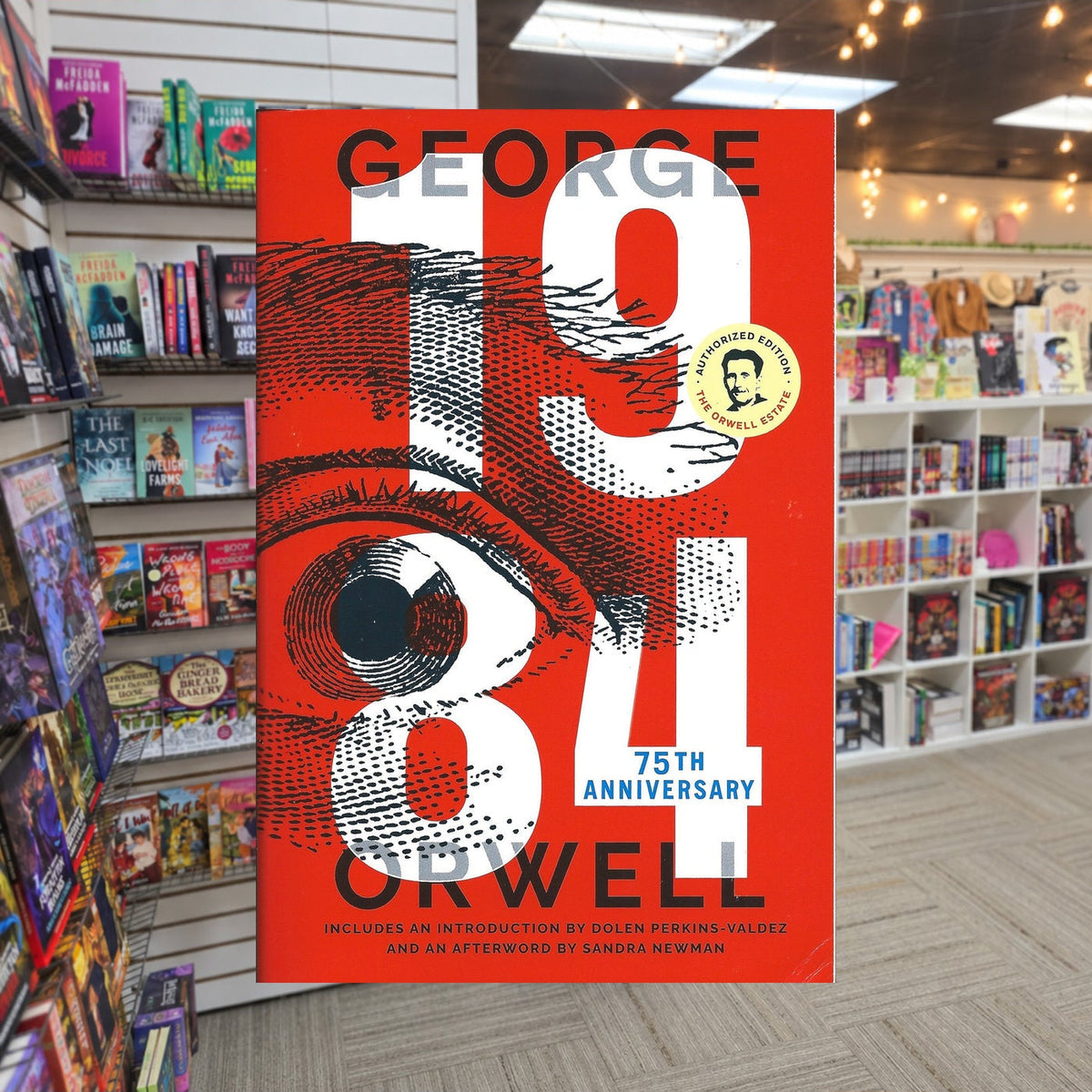 1984 by George Orwell — actual cover on The Perk bookstore background