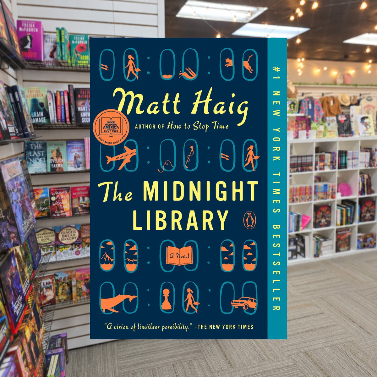 The Midnight Library by Matt Haig — actual cover on The Perk bookstore background