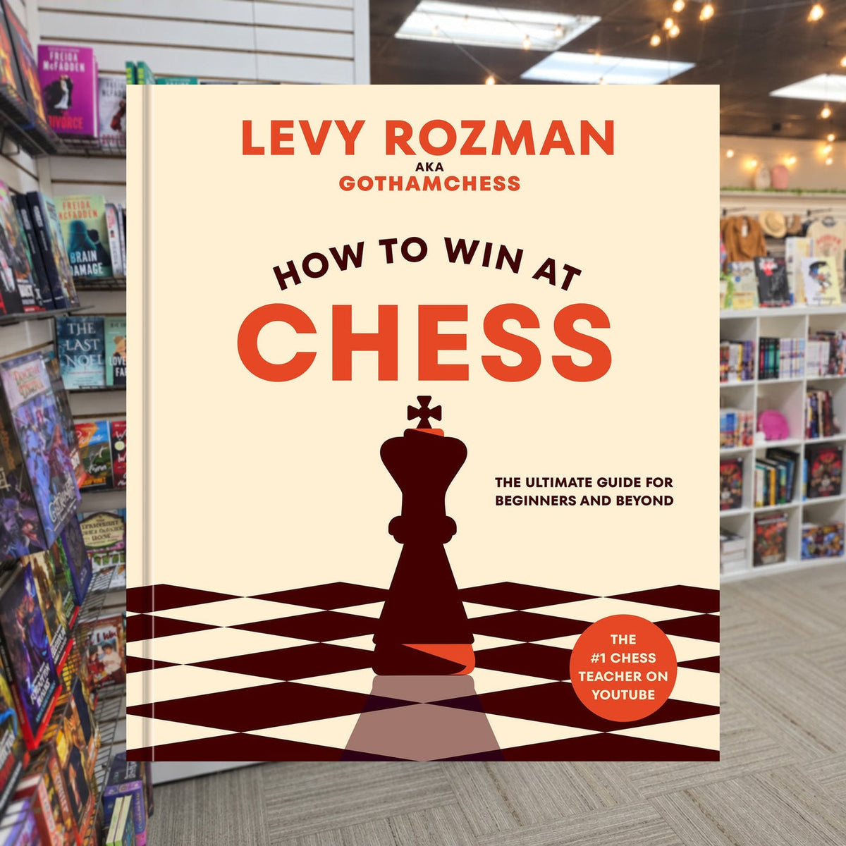How to Win at Chess by Levy Rozman — actual cover on The Perk bookstore background