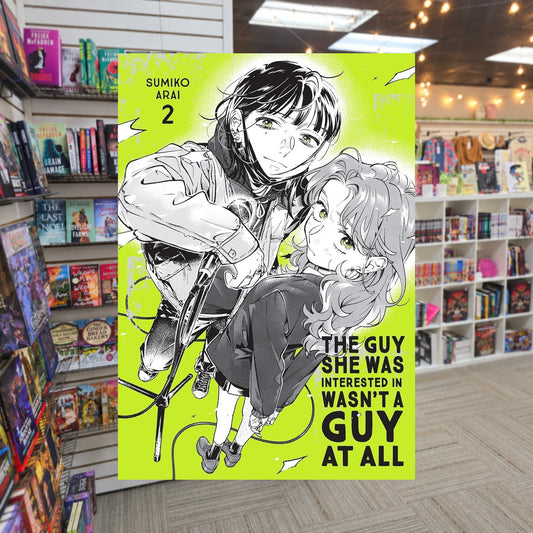 The Guy She Was Interested In Wasn't a Guy at All vol.2 by Sumiko Arai — actual cover on The Perk bookstore background