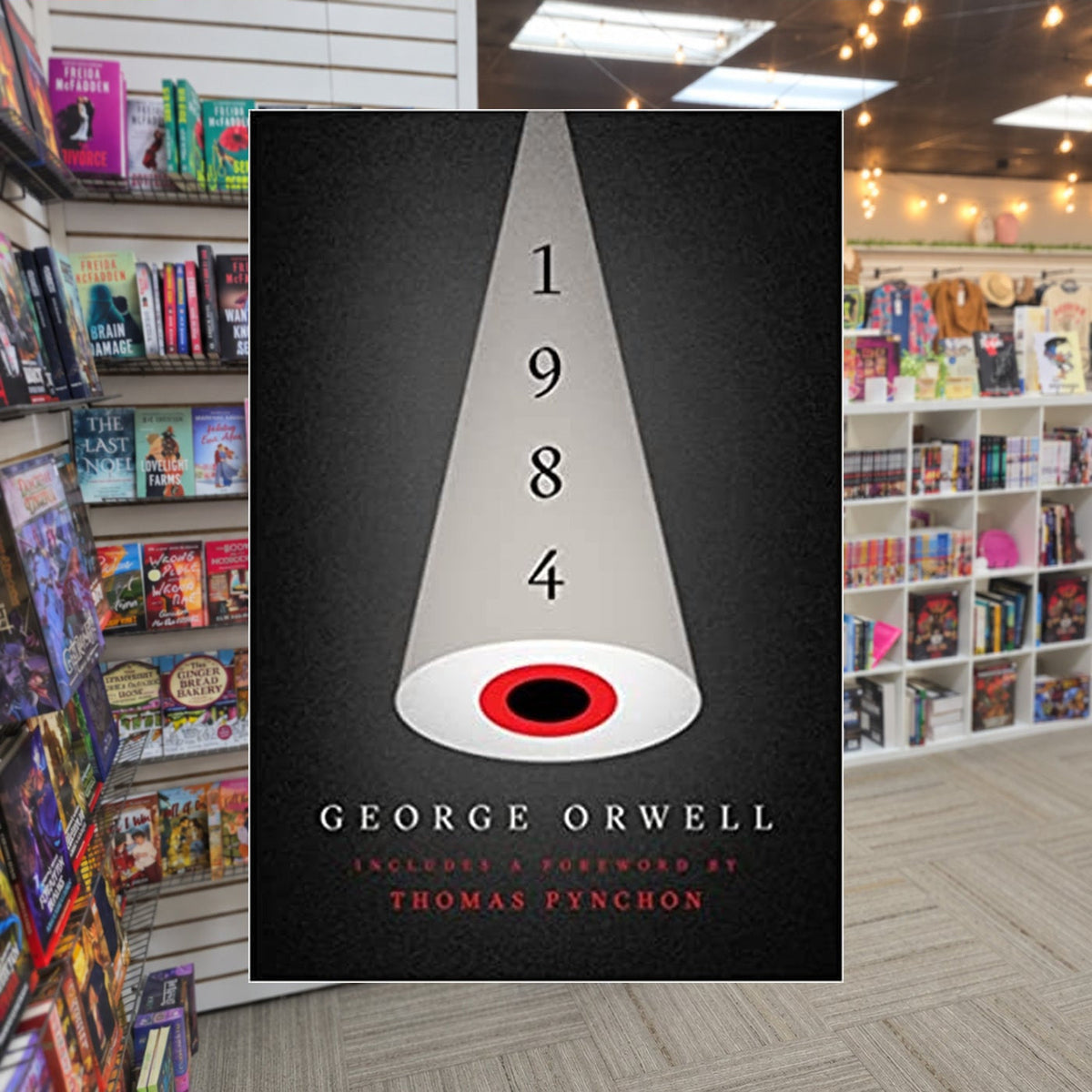 1984 by George Orwell — actual cover on The Perk bookstore background