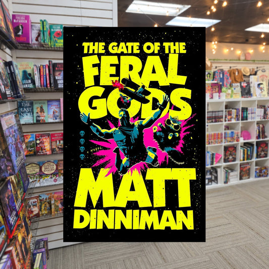 The Gate of the Feral Gods by Matt Dinniman — actual cover on The Perk bookstore background
