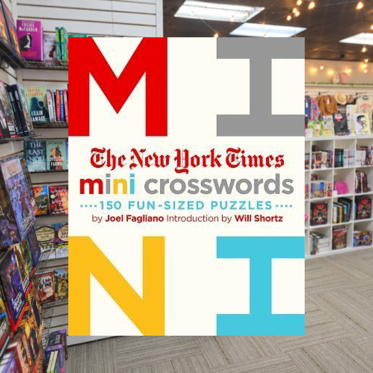 NYT Mini Crosswords by Joel Fagliano — actual cover on The Perk bookstore background