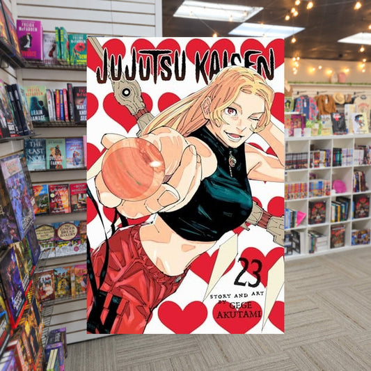 Jujutsu Kaisen vol 23 by Gege Akutami — actual cover on The Perk bookstore background
