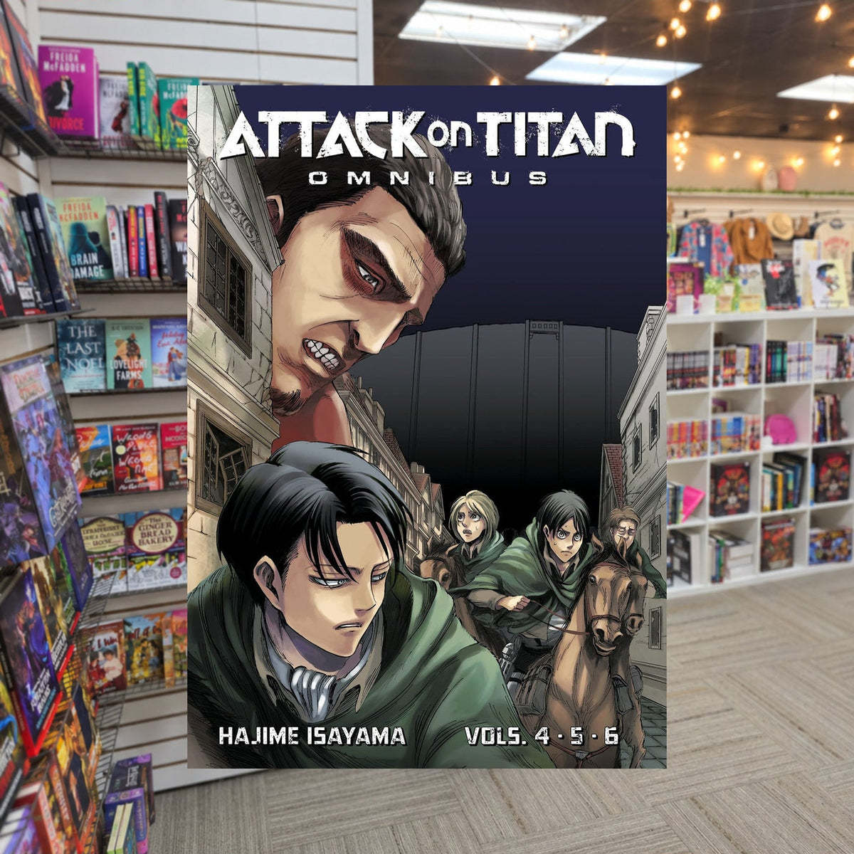 Attack on Titan Omnibus 2 by Hajime Isayama — actual cover on The Perk bookstore background