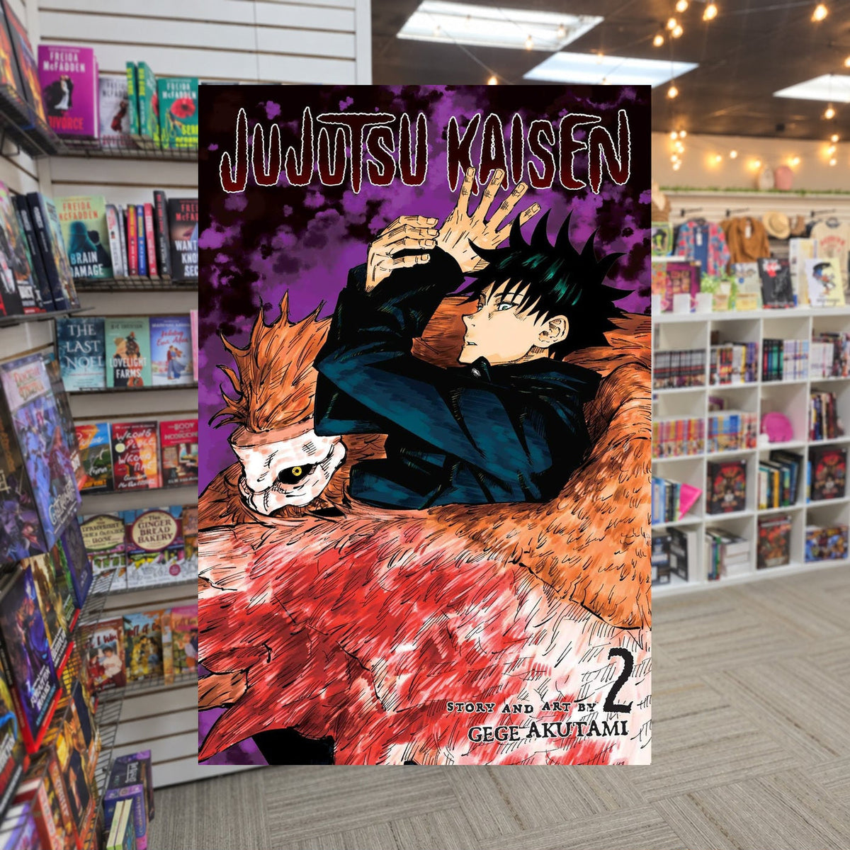 Jujutsu Kaisen, Vol. 2 by Gege Akutami — actual cover on The Perk bookstore background