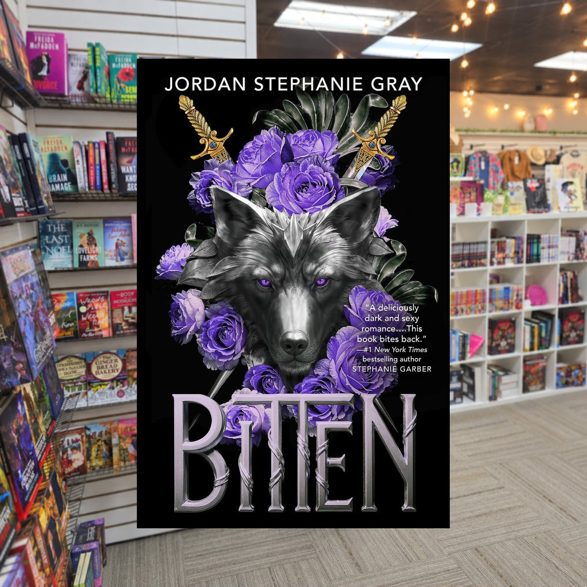 Bitten by Jordan Stephanie Gray — actual cover on The Perk bookstore background