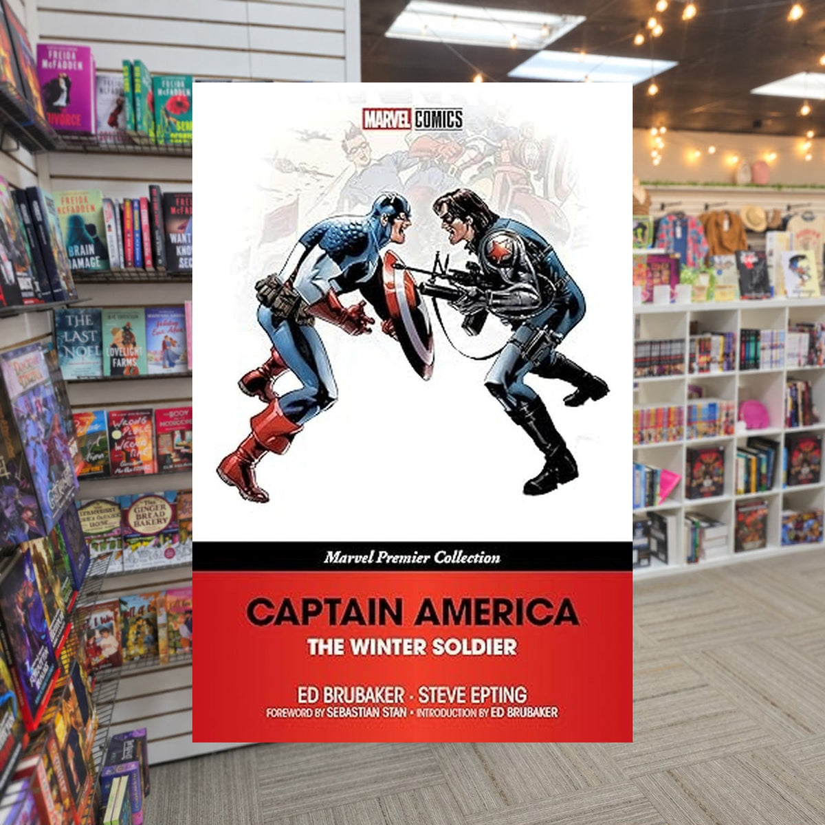CAPTAIN AMERICA: THE WINTER SOLDIER [MARVEL PREMIER COLLECTION] by Ed Brubaker — actual cover on The Perk bookstore background