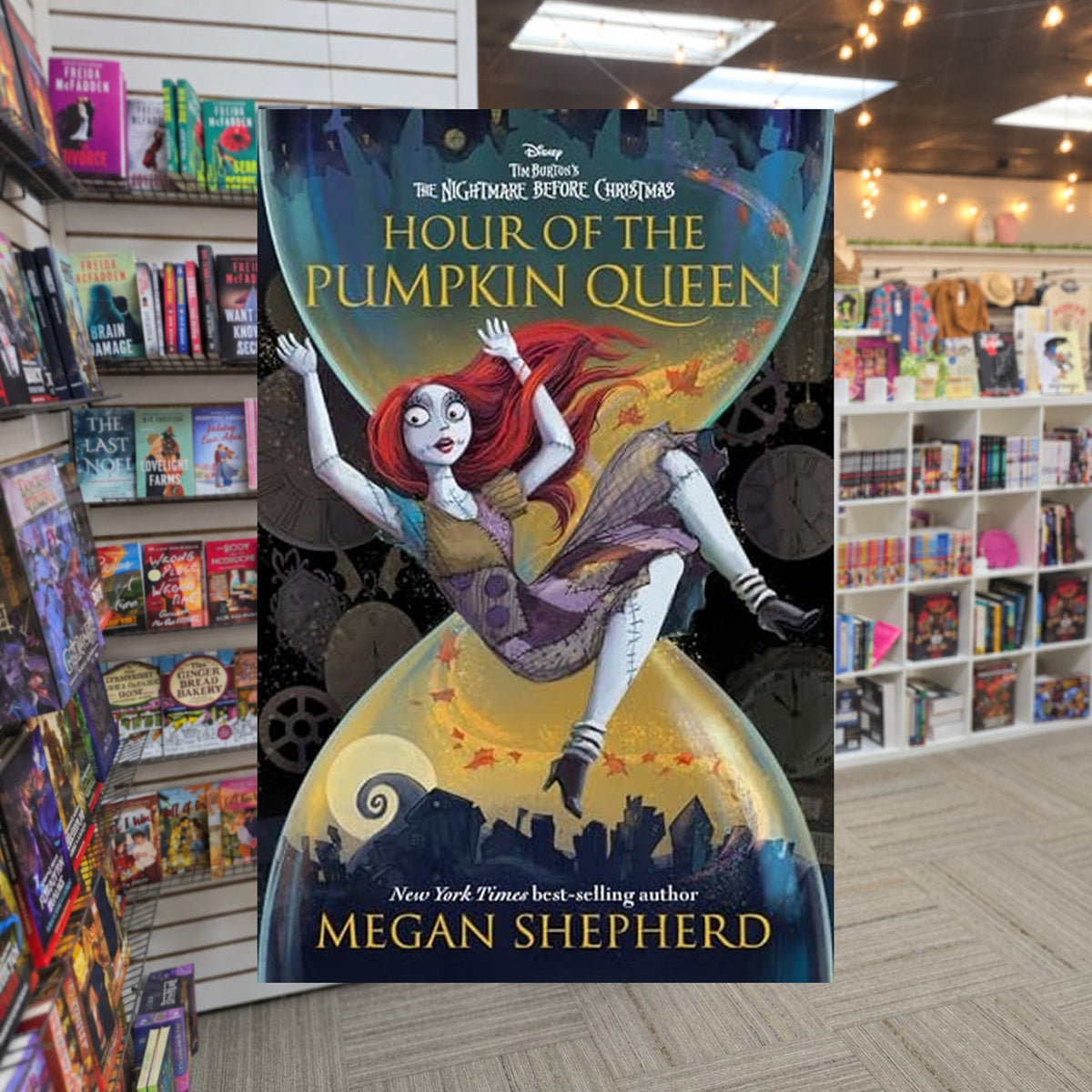 Hour of the Pumpkin Queen: Tim Burton's The Nightmare Before Christmas by Megan Shepherd — actual cover on The Perk bookstore background