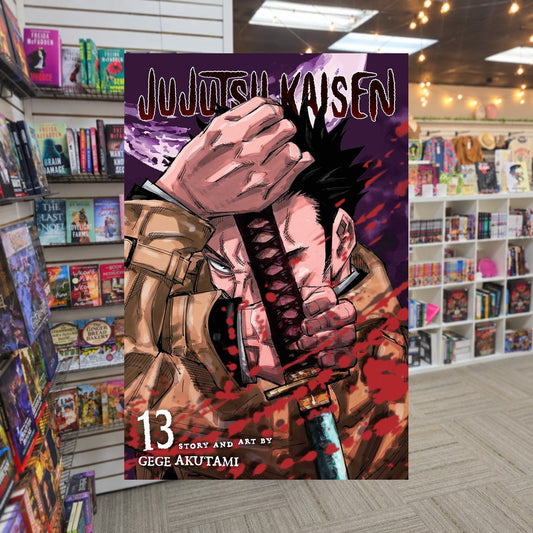 Jujutsu Kaisen, Vol. 13 by Gege Akutami — actual cover on The Perk bookstore background