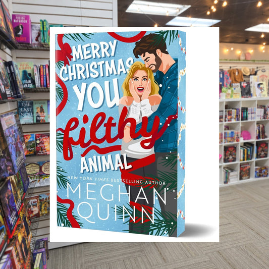 Merry Christmas, You Filthy Animal by Meghan Quinn — actual cover on The Perk bookstore background