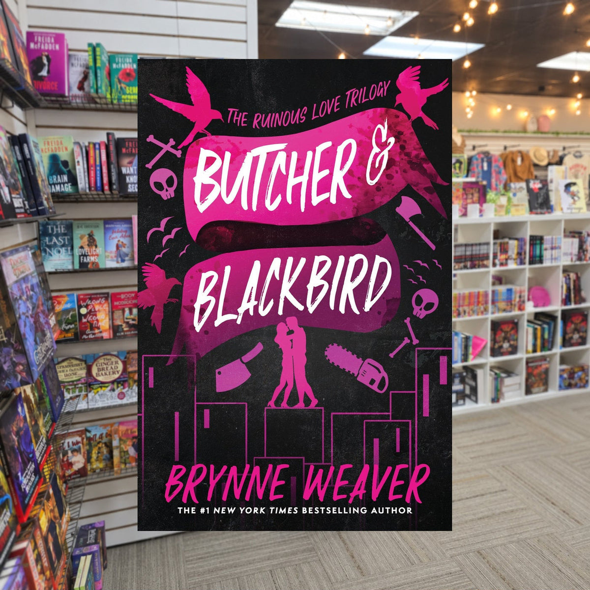 Butcher and Blackbird by Brynne Weaver — actual cover on The Perk bookstore background