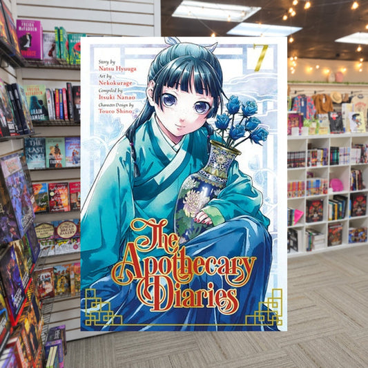 The Apothecary Diaries, Vol. 7 by Nekokurage and Natsu Hyuuga — actual cover on The Perk bookstore background