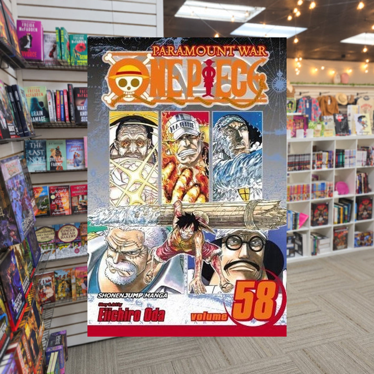 One Piece, Volume 58: The Name of This Era is "Whitebeard" by Eiichiro Oda — actual cover on The Perk bookstore background