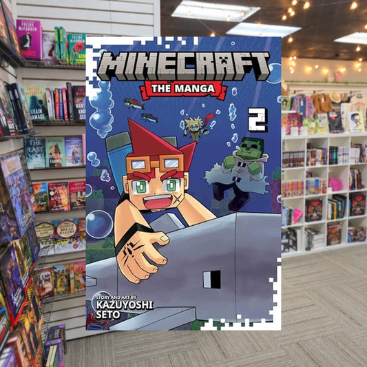 Minecraft: The Manga, Vol.2 by Kazuyoshi Seto — actual cover on The Perk bookstore background