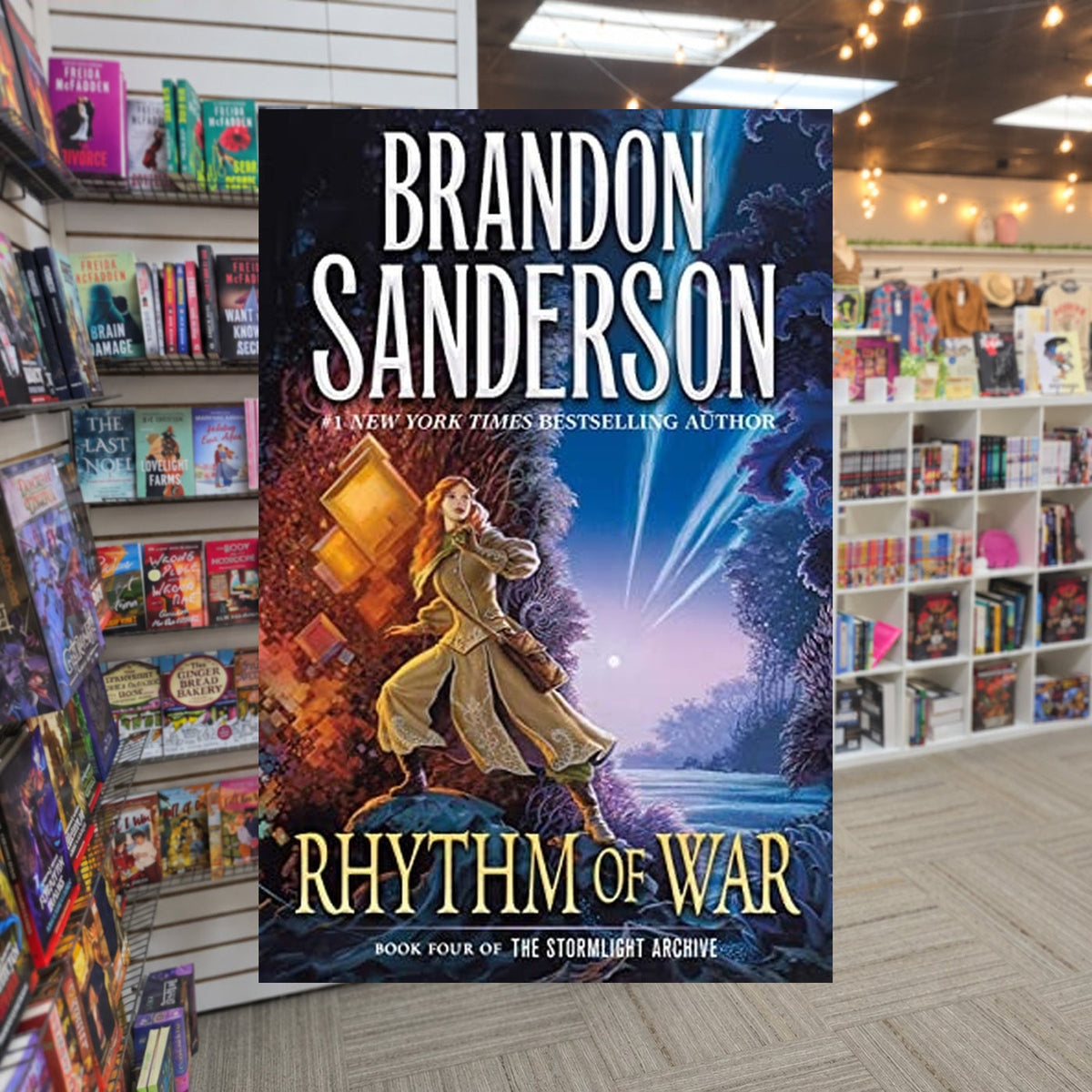 Rthym of War by Brandon Sanderson — actual cover on The Perk bookstore background