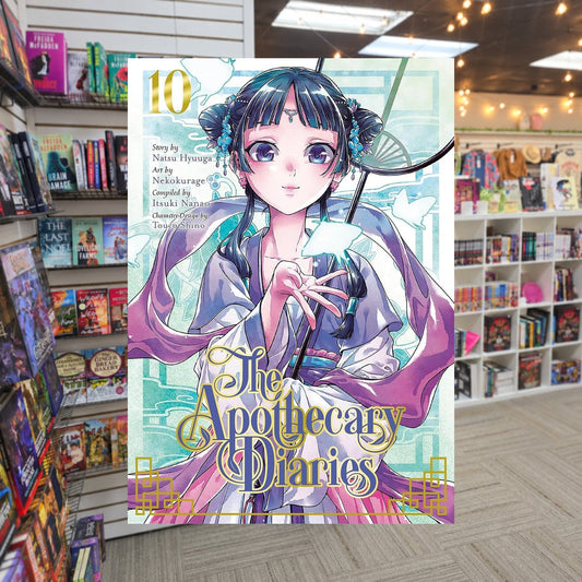 The Apothecary Diaries, Vol. 10 by Nekokurage and Natsu Hyuuga — actual cover on The Perk bookstore background