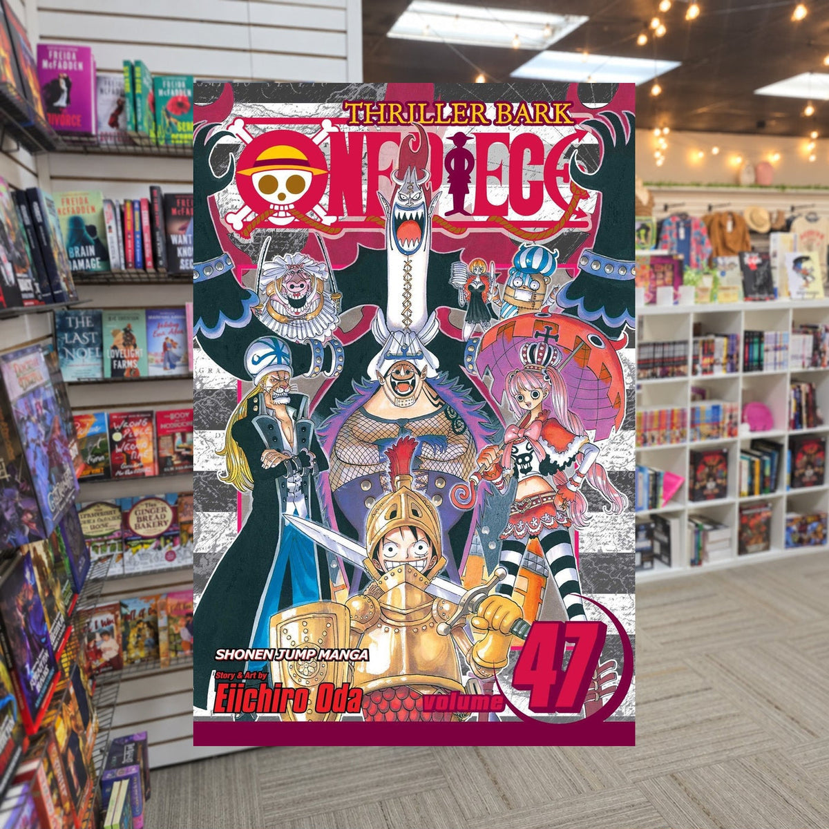 One Piece, Volume 47: Cloudy Partly Bony by Eiichiro Oda — actual cover on The Perk bookstore background