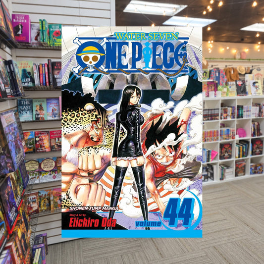 One Piece, Volume 44: Let's Go Back by Eiichiro Oda — actual cover on The Perk bookstore background