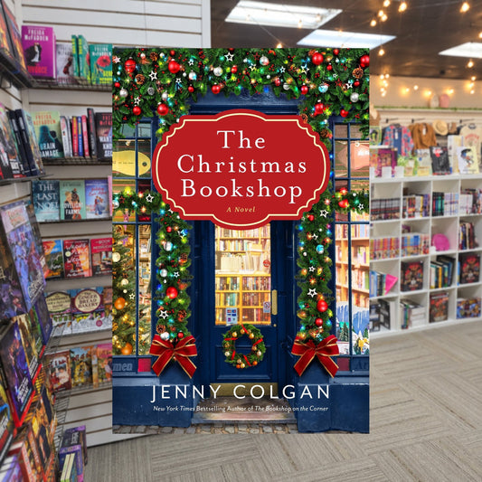The Christmas Bookshop by Jenny Colgan — actual cover on The Perk bookstore background