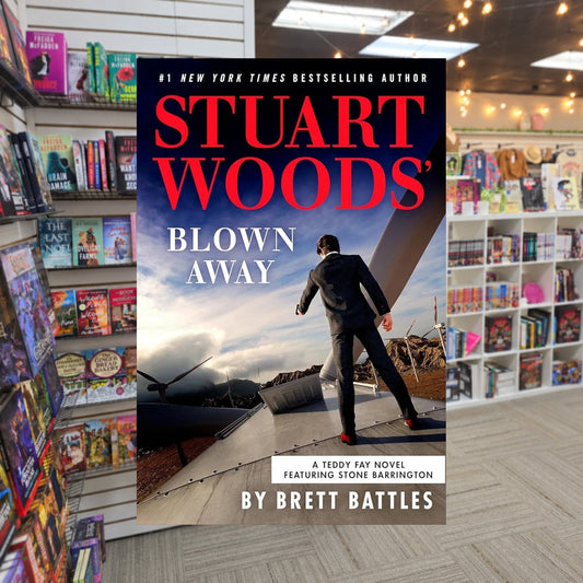 Stuart Woods' Blown Away by Brett Battles & Stuart Woods — actual cover on The Perk bookstore background
