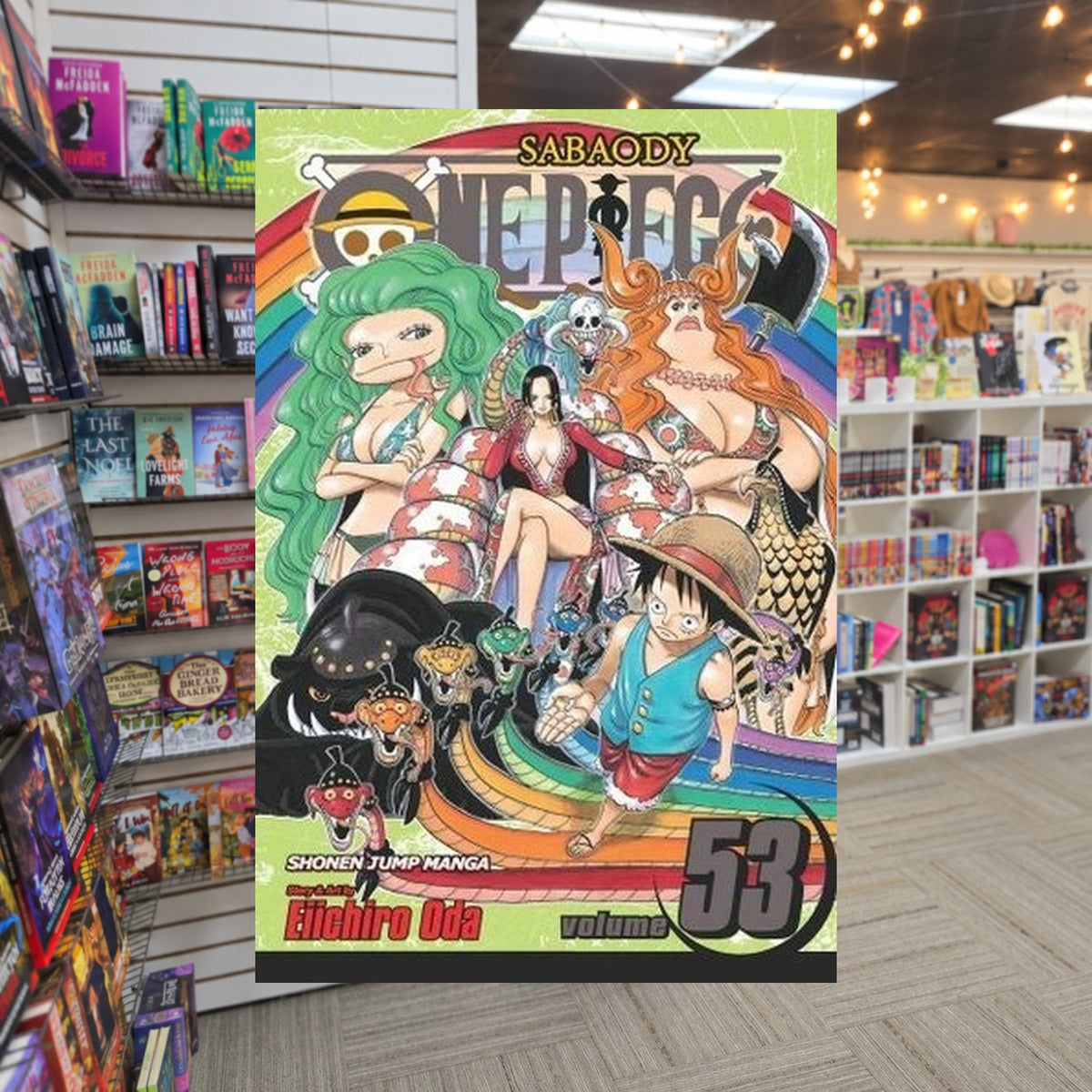 One Piece, Volume 53: Natural Born King  Eiichiro Oda — actual cover on The Perk bookstore background