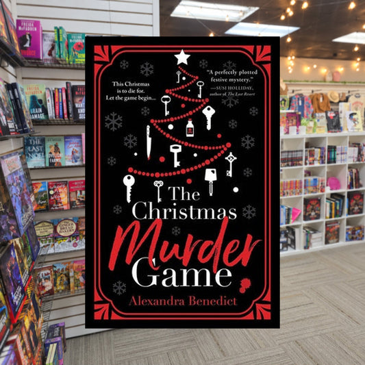 The Christmas Murder Game by Alexandra Benedict — actual cover on The Perk bookstore background