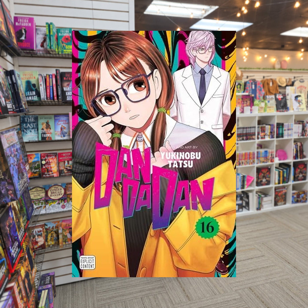 Dandadan, Vol. 16 by Yukinobu Tatsu — actual cover on The Perk bookstore background