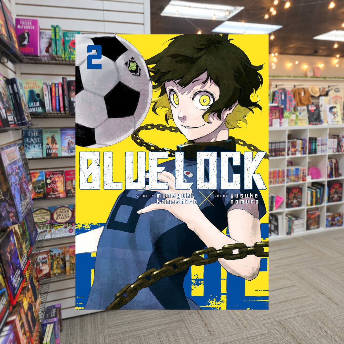 Blue Lock, Vol. 2 by Muneyuki Kaneshiro — actual cover on The Perk bookstore background