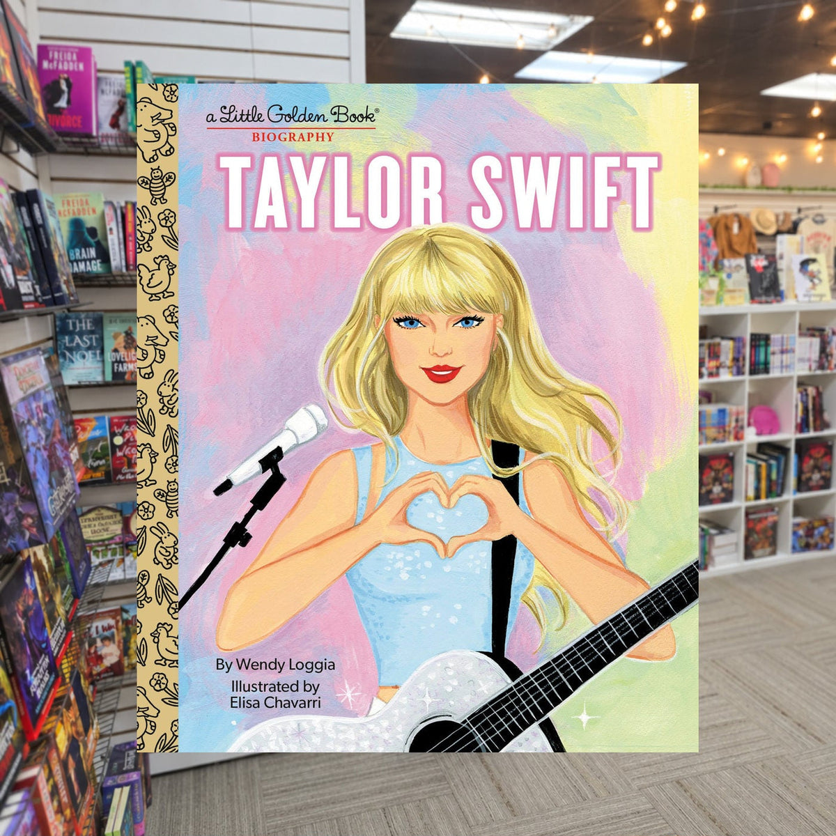 Taylor Swift: A Little Golden Book Biography  Wendy Loggia — actual cover on The Perk bookstore background