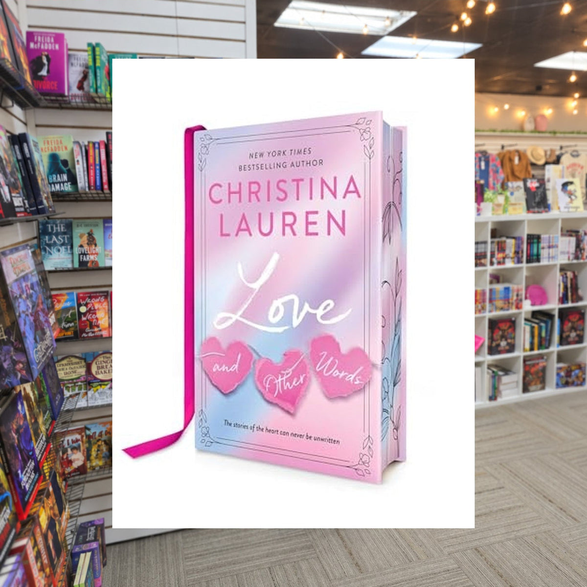 Love and Other Words: Deluxe Edition by Christina Lauren — actual cover on The Perk bookstore background