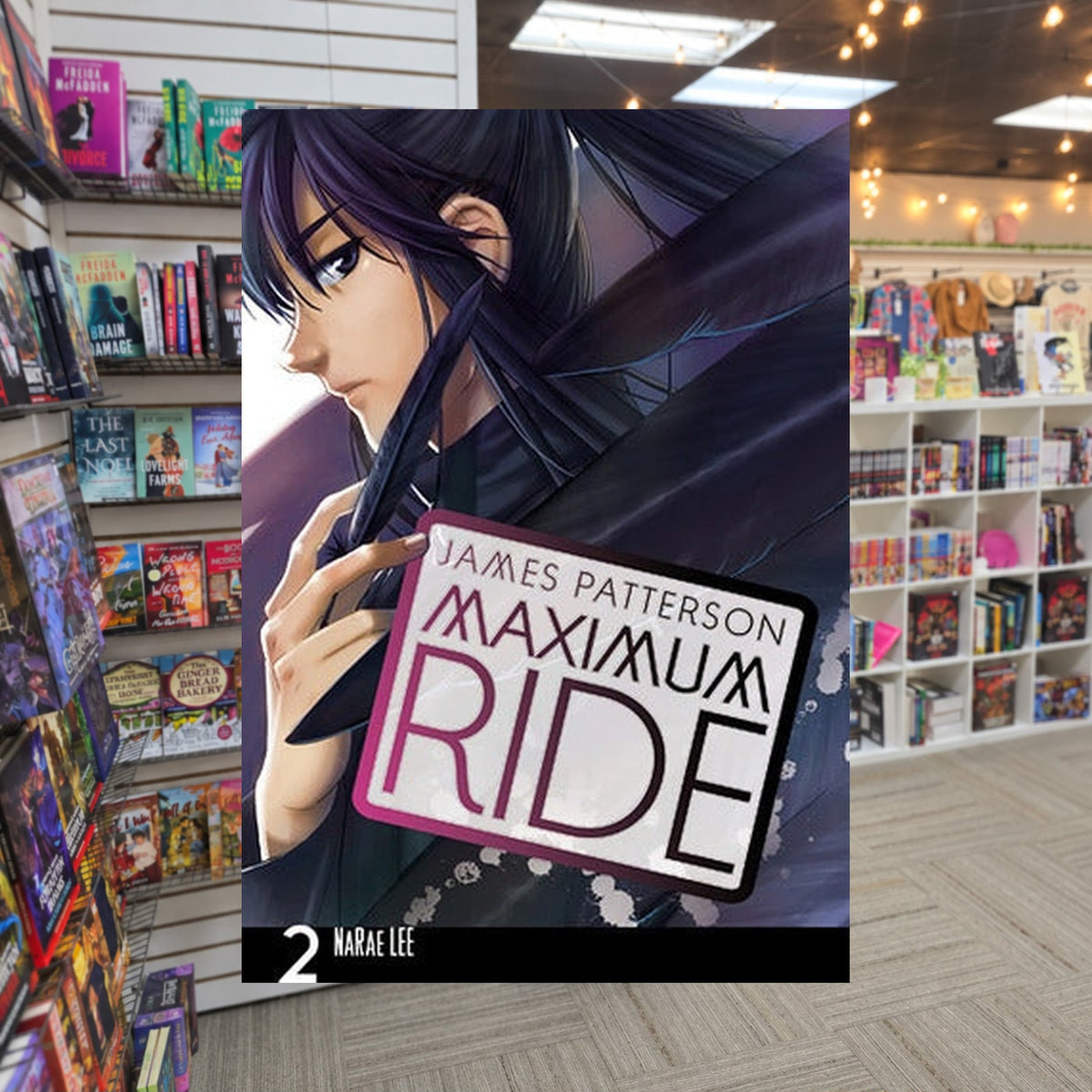 Maximum Ride, Vol. 2 by NaRae Lee — actual cover on The Perk bookstore background