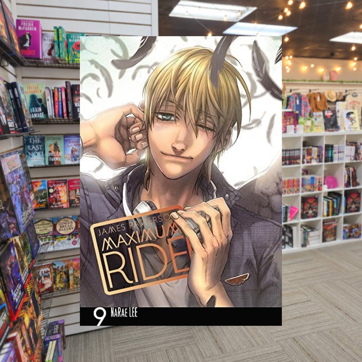 Maximum Ride, Vol. 9 by NaRae Lee — actual cover on The Perk bookstore background