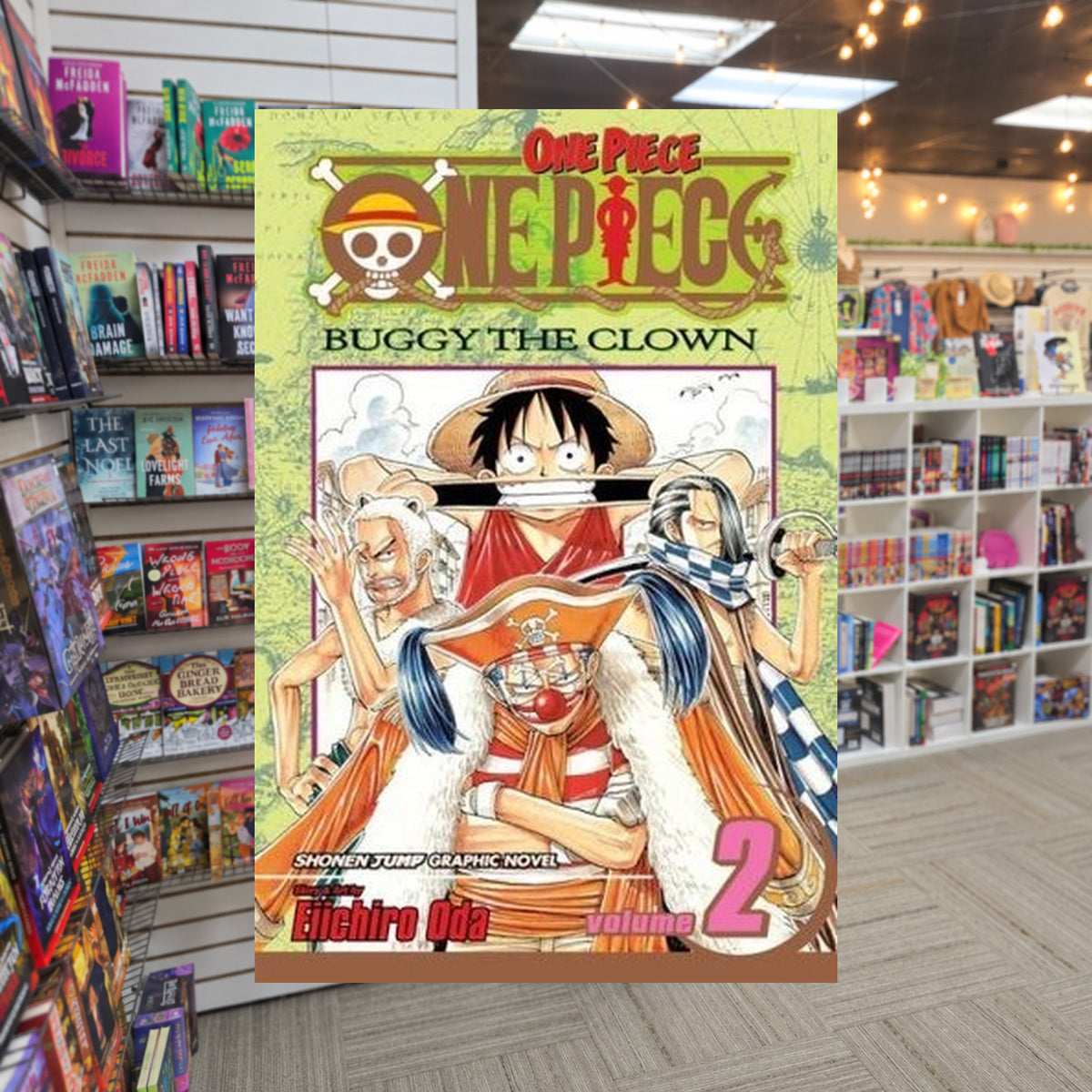 One Piece, Volume 2: Buggy the Clown by Eiichiro Oda — actual cover on The Perk bookstore background