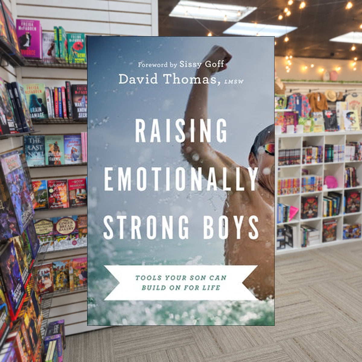 Raising Emotionally Strong Boys: Tools Your Son Can Build on for Life by David Thomas — actual cover on The Perk bookstore background