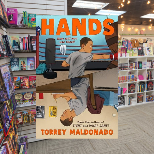 Hands by Torrey Maldonado — actual cover on The Perk bookstore background