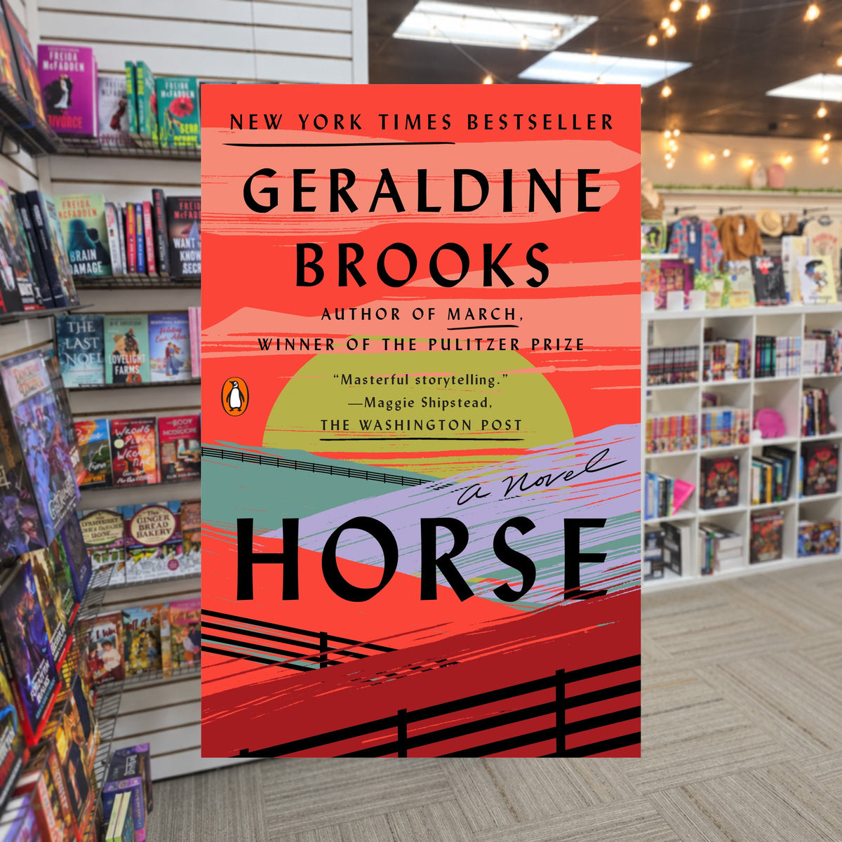 Horse by Geraldine Brooks — actual cover on The Perk bookstore background
