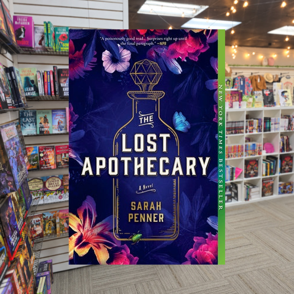The Lost Apothecary — actual cover on The Perk bookstore background